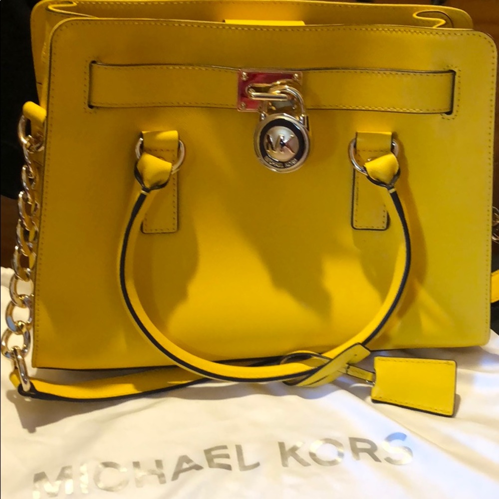 Brand new Michael Kors medium sized purse.
